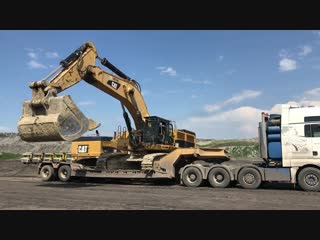 video huge liebher cat and komatsu loading unloading by side fasoulas transports sex